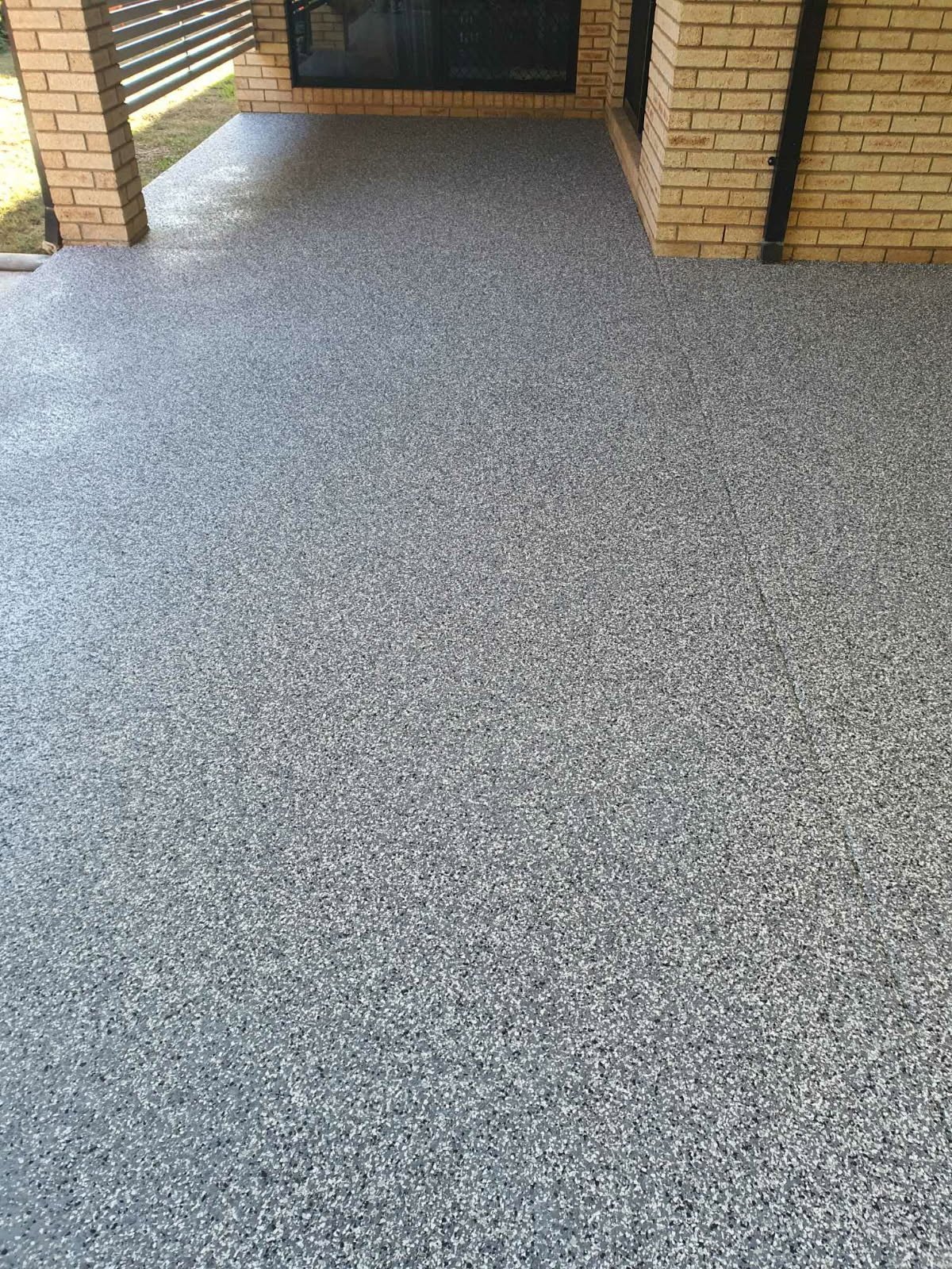 Grey flake alfresco floor by PrimeShield Epoxy