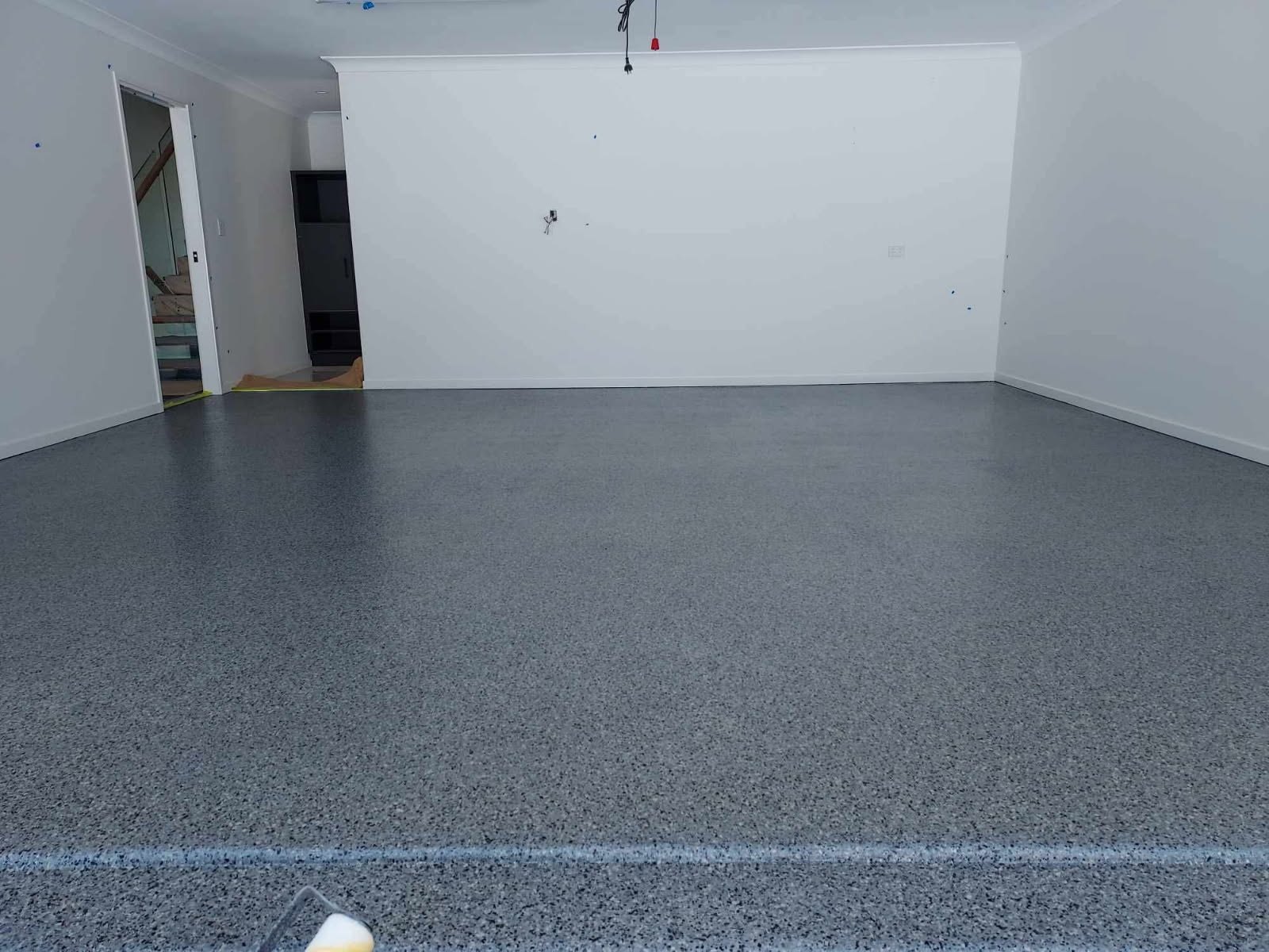 Grey flooring completed by PrimeShield Epoxy